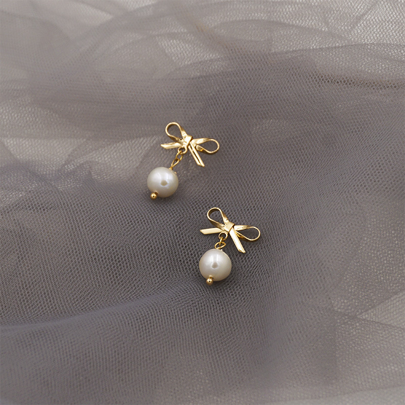 S925 silver needle stud earrings, elegant pearl Korean bow earrings, cute pendant accessories, fashionable and versatile earrings Application Scenario