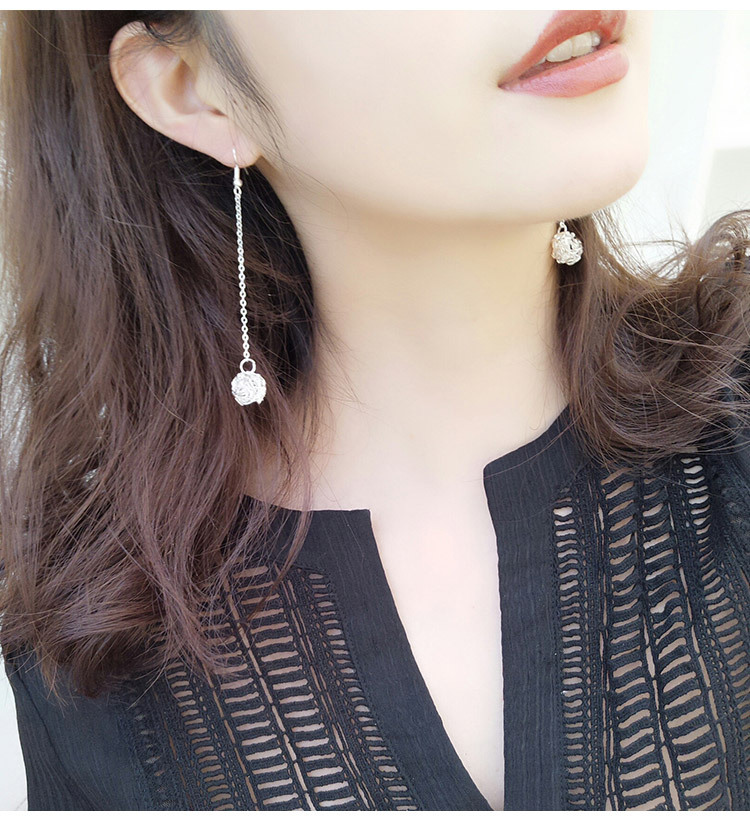 Korean retro hollowed-out metal woven spherical geometric circle earrings, long tassel earrings, women's factory wholesale full figure