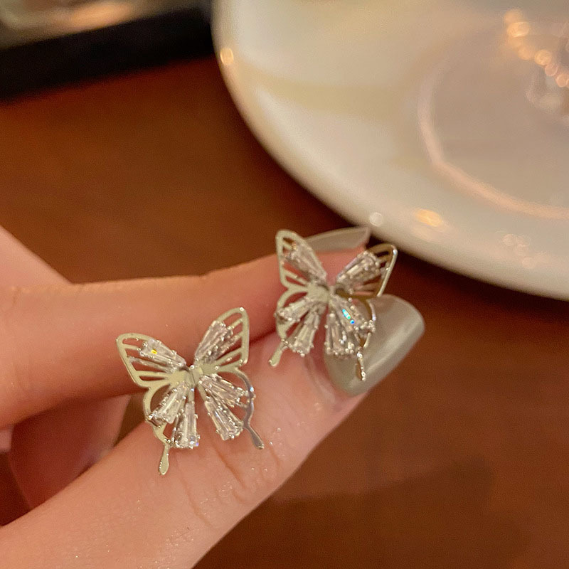 S925 Silver Needle Korean hollowed-out bow Super Flash Zircon, niche style, versatile, high-end design earstud earrings full figure
