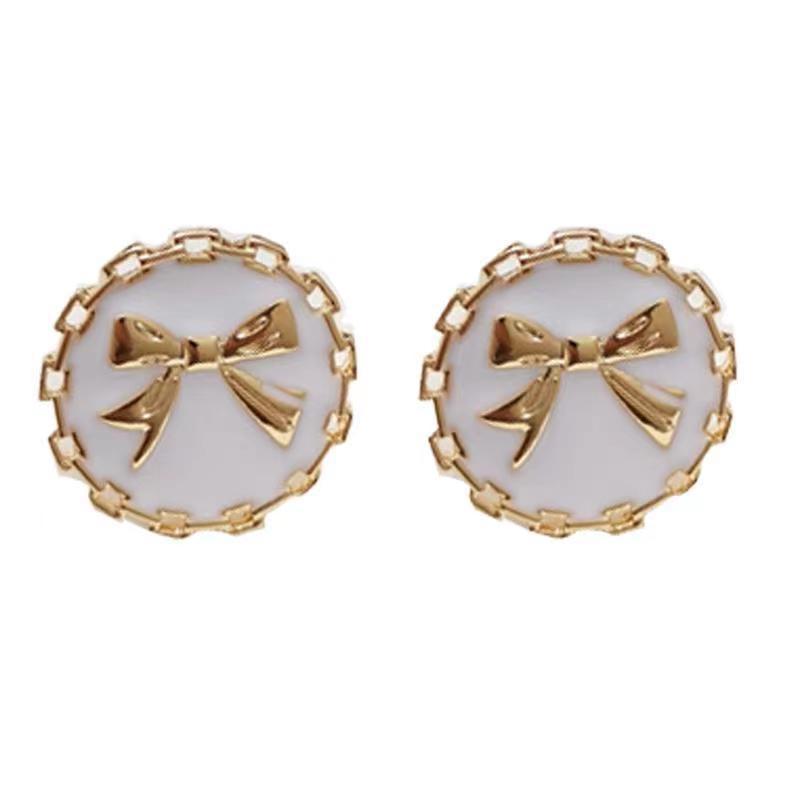 S925 Silver needle Korean cute bow round button stud earrings, forest style retro girl black and white two-color earrings Item Picture