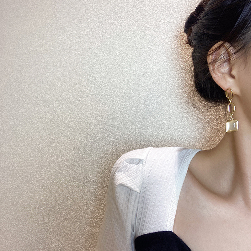 European and American fashion long chain geometric cat's eye stone pendant earrings, women's creative design sense stud earrings details Picture