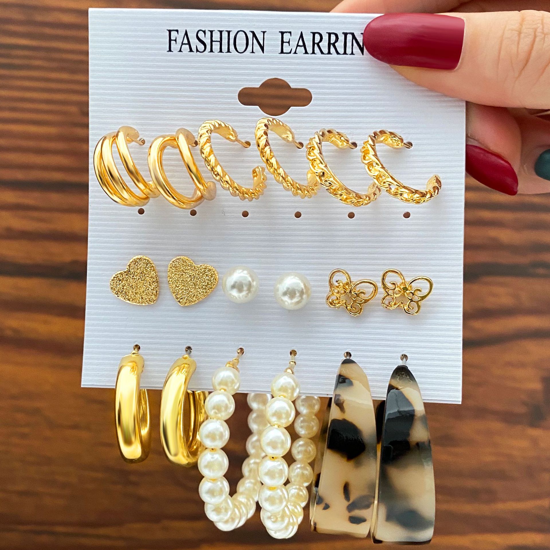 Leopard print acrylic earrings, retro heart-shaped imitation pearl stud earrings, metal ear ring earrings, high-end earrings wholesale full figure