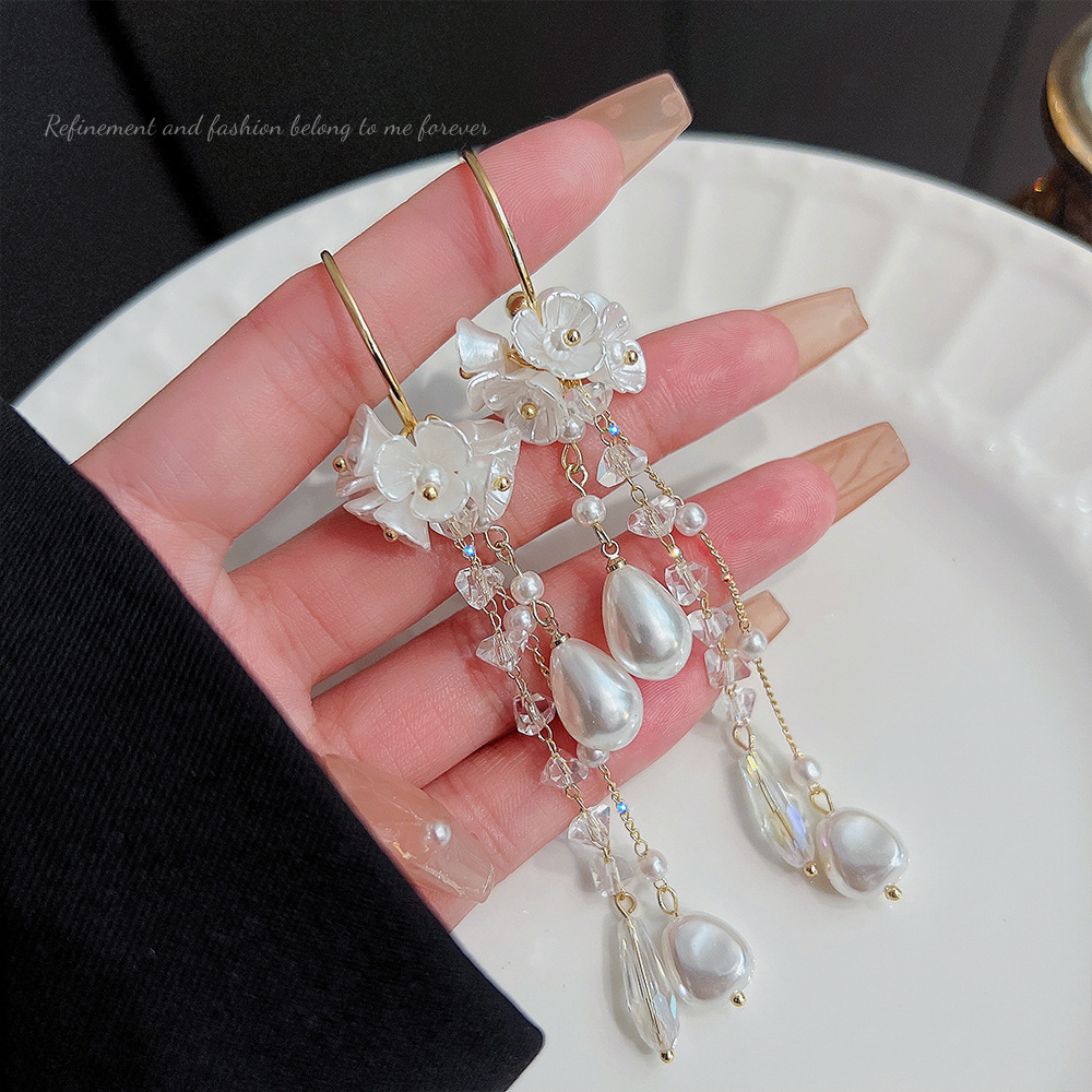 S925 Silver Needle Korean version Super Fairy Irregular pearl flower tassel earrings, exaggerated and fashionable, shining Zircon long chain earrings full figure