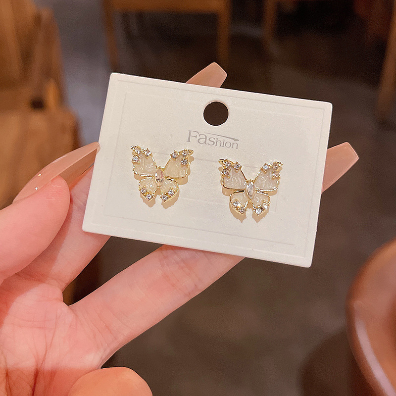 925 Silver Needle Light Luxury Niche cat's Eye Stone earrings, the same style as the trendy female Instagram influencer, super ethereal butterfly stud earrings full figure