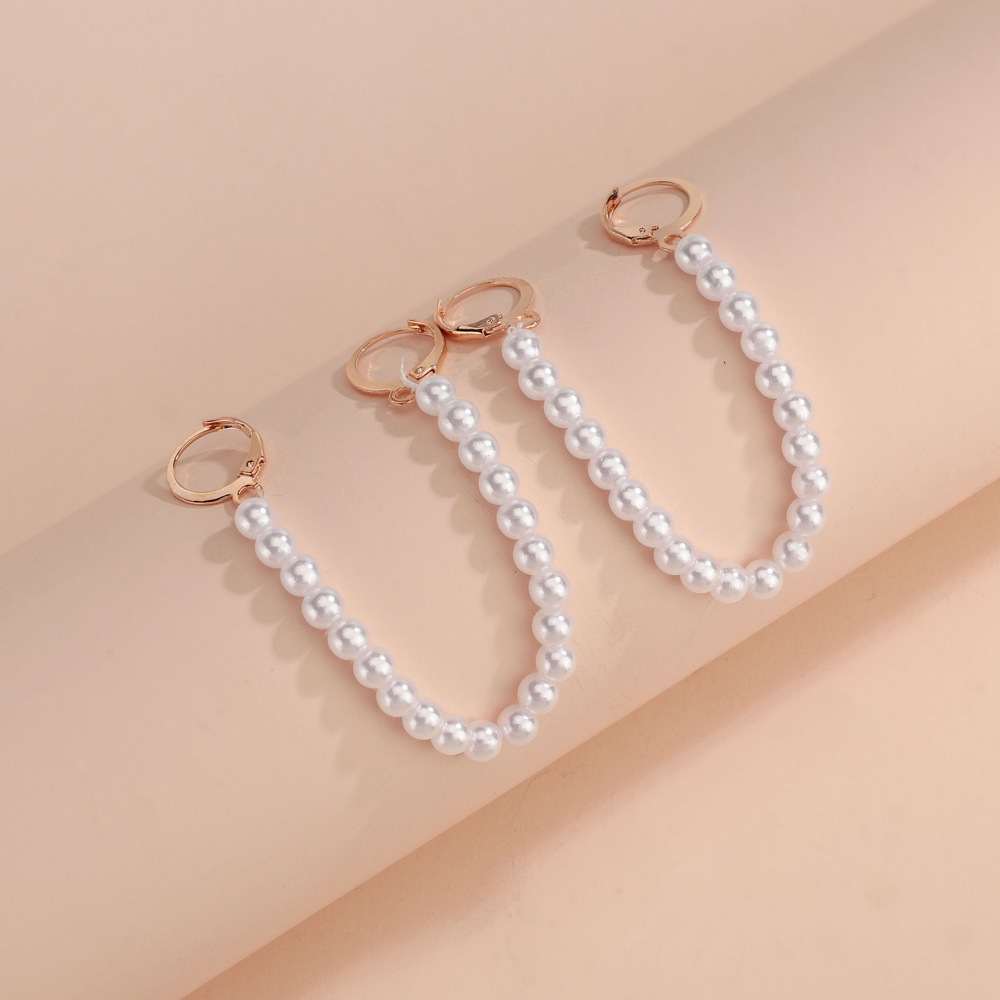 The fashionable and elegant pearl long ear clips are simple and individual earrings, suitable for women's commutes and vacations details Picture