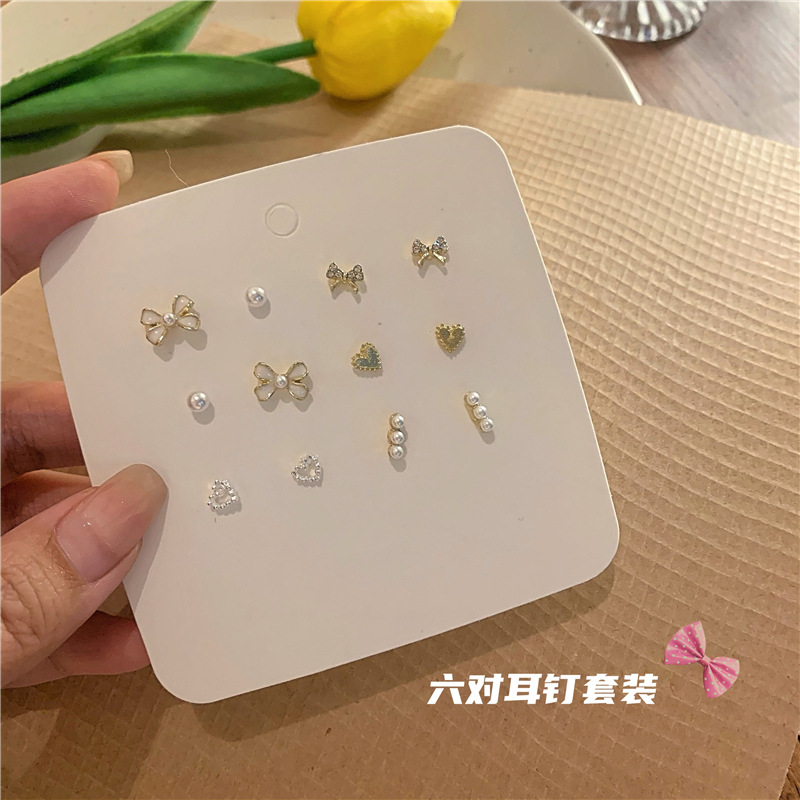 A six-piece set of Japanese and Korean style heart-shaped pearl bow earrings, small and versatile for women, trendy high-end earrings and earrings Specification drawing