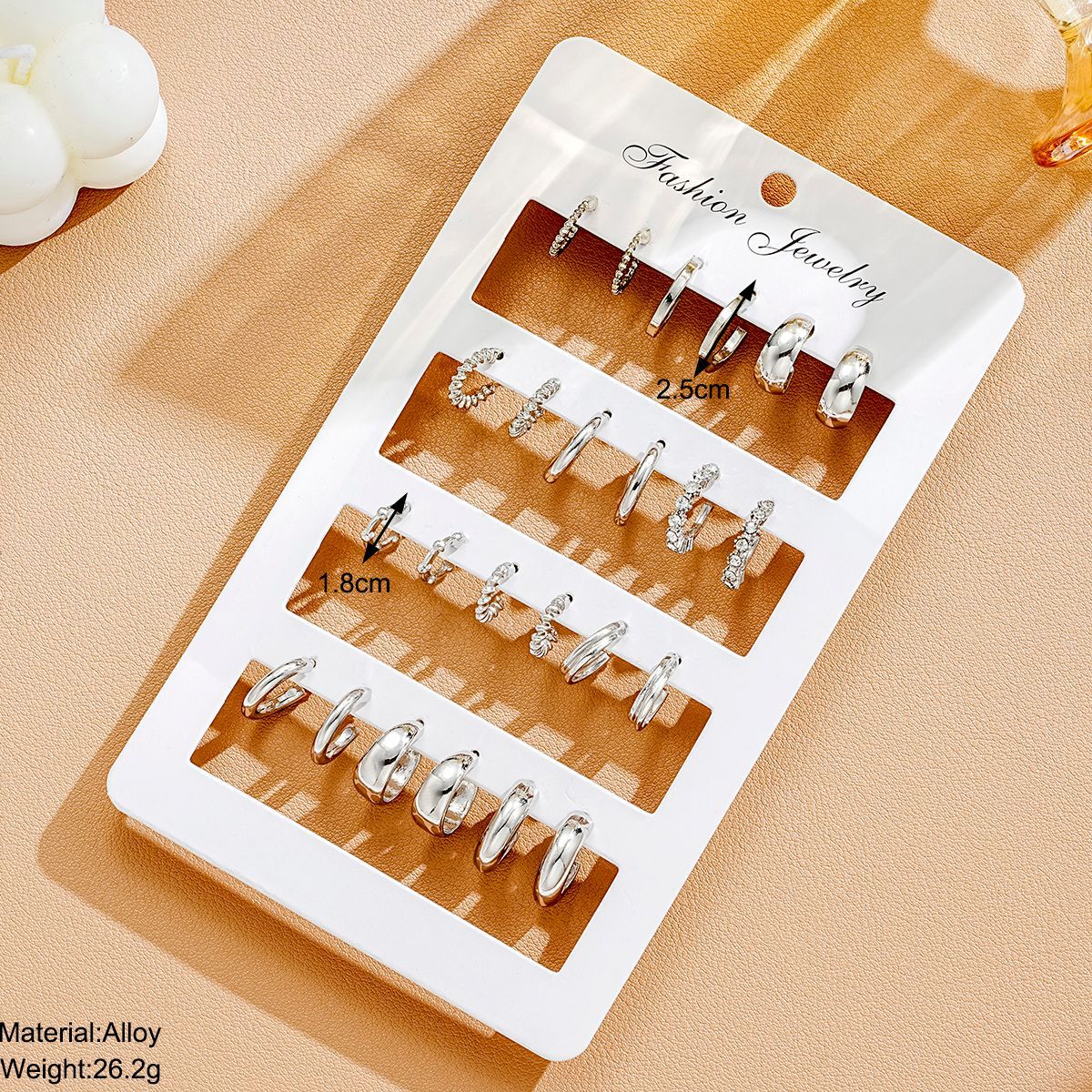 A 12-piece set of cross-border new European and American style creative C-shaped point diamond earrings, a fashionable accessory with a high-end feel Specification drawing