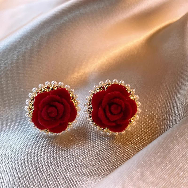 Ankela red flower pearl stud earrings for women exude a light luxury and high-end charm with a unique flocked style. They are versatile earrings for autumn and winter details Picture
