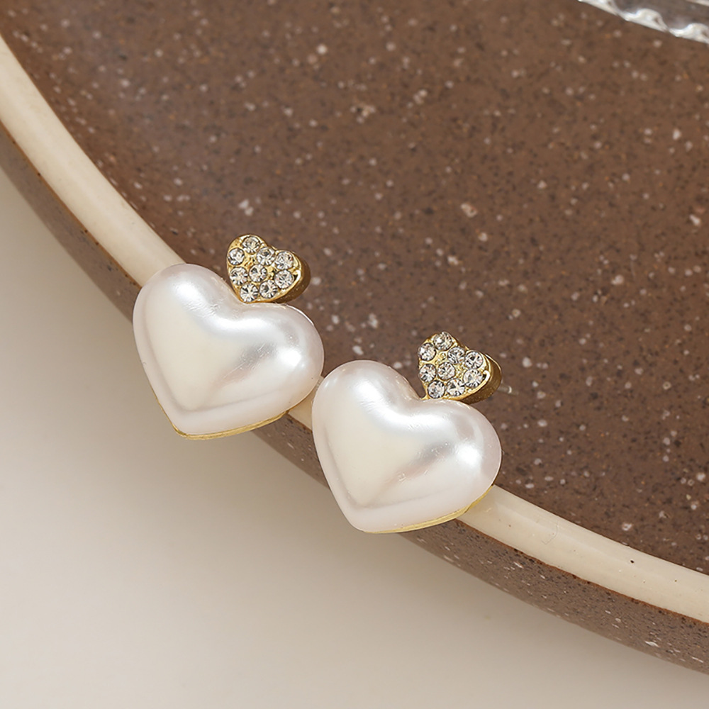 New pure silver pearl stud earrings and flower earrings for women, with a unique design sense, are light luxury earrings that are fresh and sweet full figure