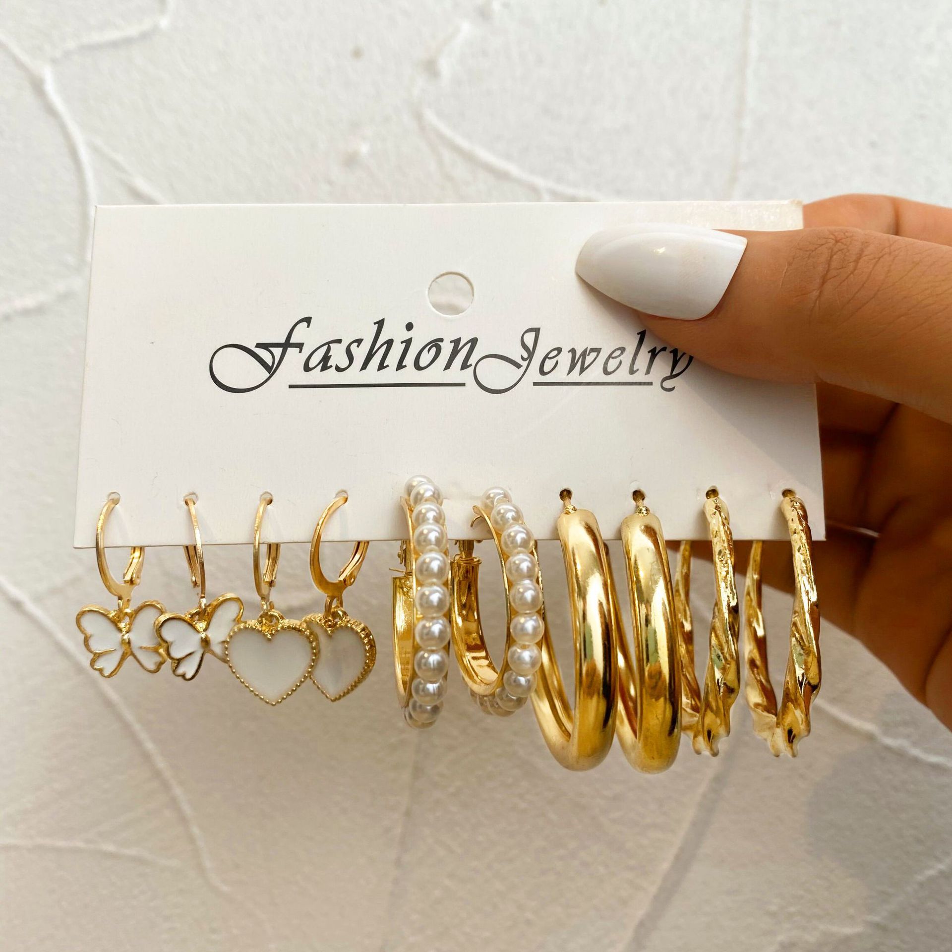 Cross-border circle ear ring creative imitation pearl ring earrings set of 5 pieces acrylic butterfly pendant earrings Application Scenario