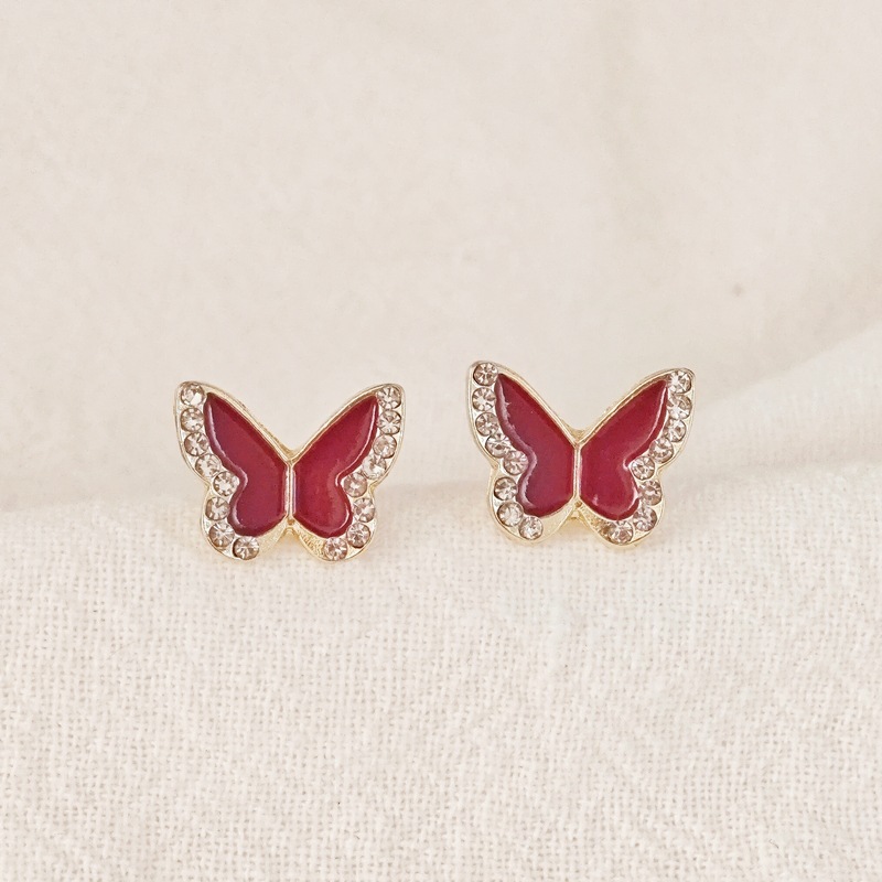 The new Korean sweet and cool black, red and white butterfly earrings feature a niche design and a touch of light luxury and sophistication Application Scenario