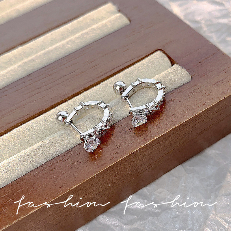 Stud earrings female niche senior design sense of zircon ear bone screw twist button earrings 2024 new hot style earrings details Picture