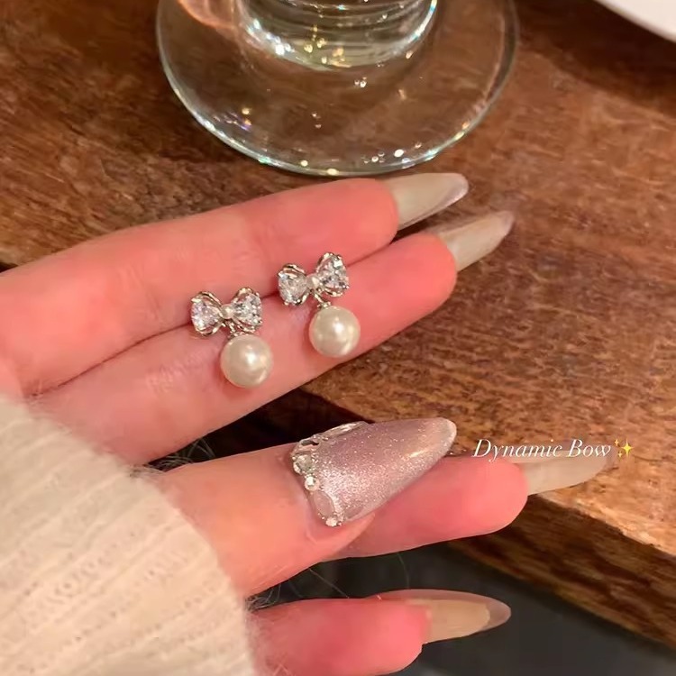 S925 Silver Needle Exquisite Zircon bow Earrings for Women, light luxury, niche, versatile and elegant pearl stud earrings wholesale full figure