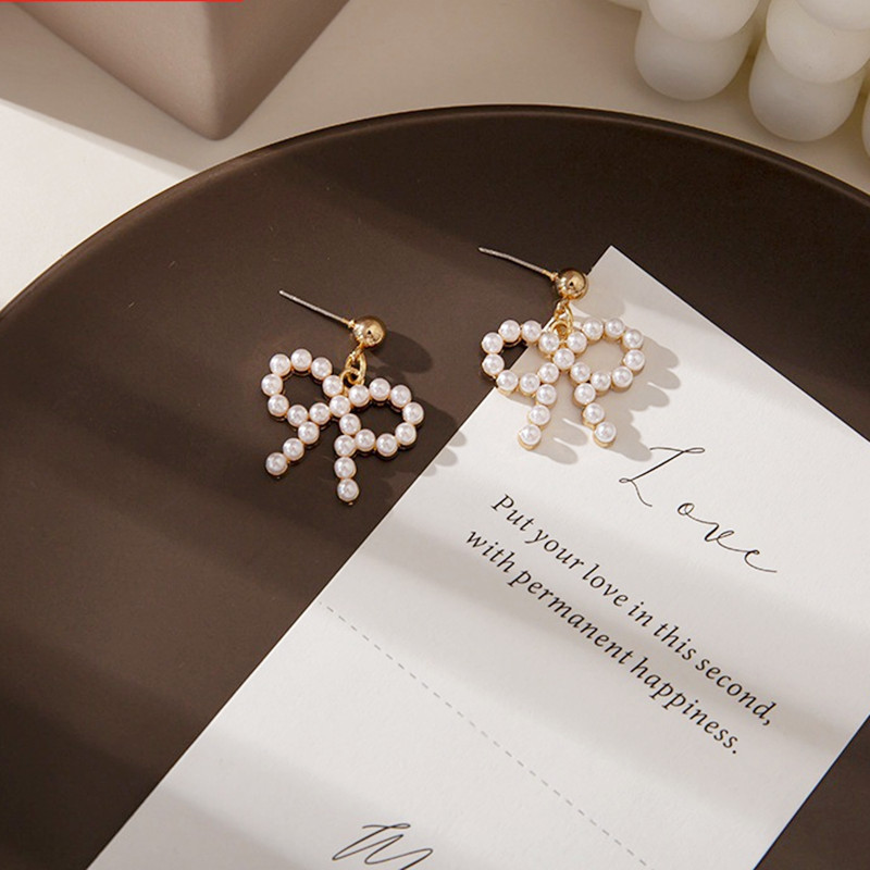 Trendy new Korean-style pearl butterfly pearl individual simple and elegant steel needle gold stud earrings for women full figure