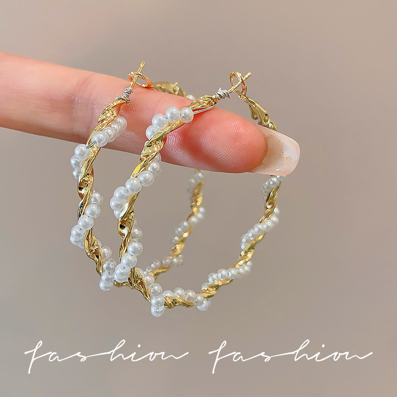 European and American wrapped pearl metal ring earrings, ins, Korean Dongdaemun round face slimming exaggerated geometric earrings full figure