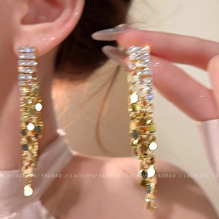 Golden long tassel earrings for girls, 2025 new style, light luxury and high-end feel, elegant and grand, small earrings that show off the face details Picture