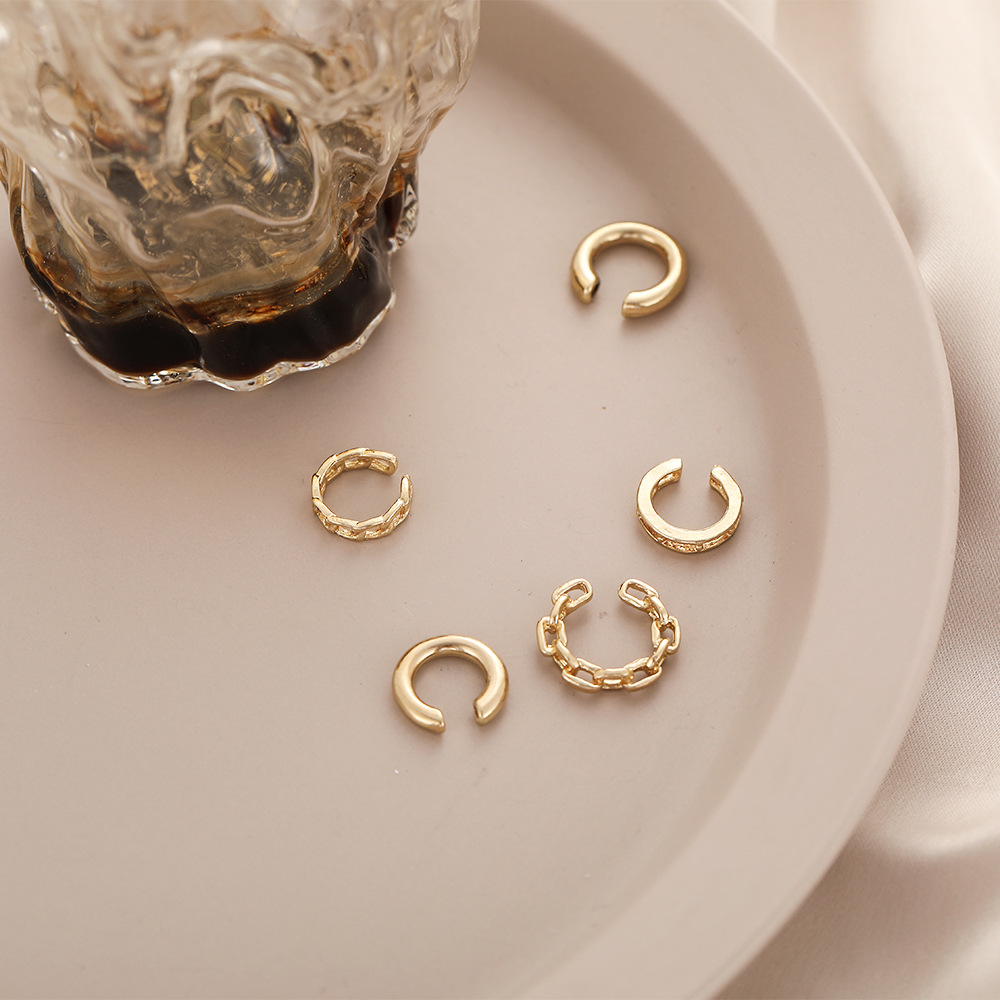 Creative and simple five-piece ear bone clip set without ear holes, personalized golden chain hollowed-out multi-layer earrings, C-shaped ear clip for women details Picture