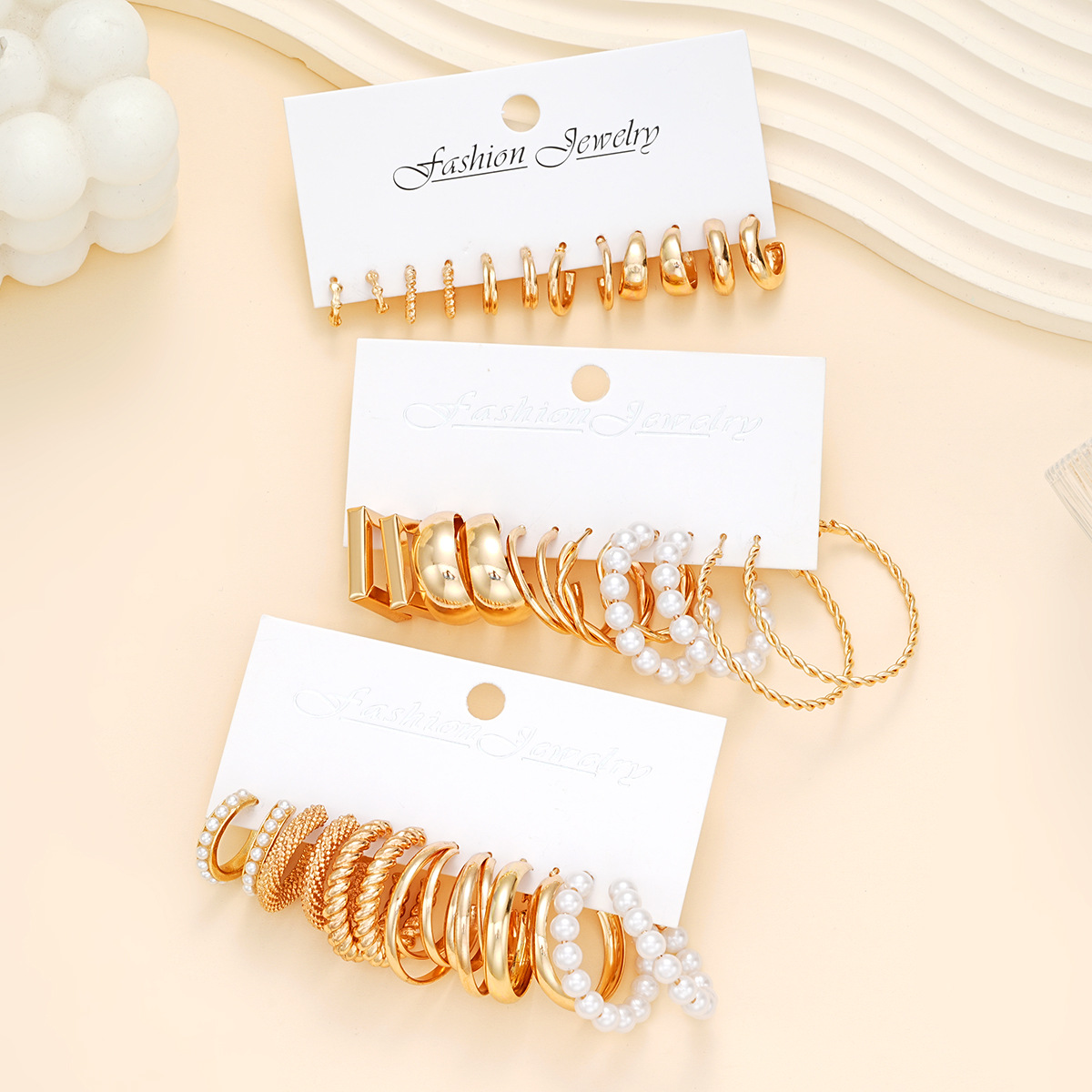 A 18-piece set of popular cross-border geometric imitation pearl twist earrings from Europe and America, a C-shaped light luxury and elegant women's earring set Specification drawing