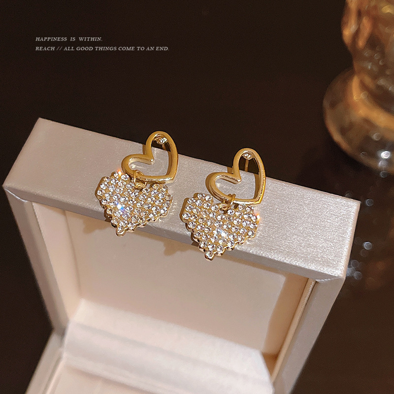 S925 Silver needle high-end full-diamond heart-shaped earrings, feminine charm, niche design, ins style stud earrings Application Scenario