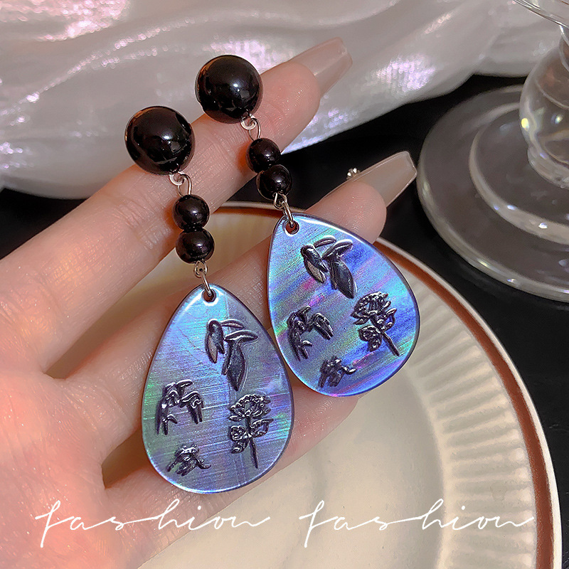 Floating light and shadow Bamboo New Chinese-style retro resin tassel earrings, light luxury and high-end, niche design, elegant cheongsam earrings full figure