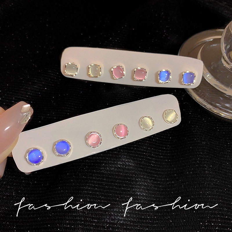Pink small cat's eye stone ear stud earrings for women, no need to remove ear bone stud earrings for sleeping, light luxury and high-end ear piercing earrings details Picture