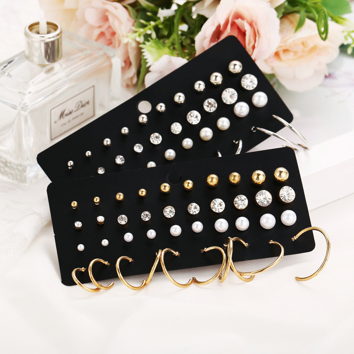 Wholesale of 20 pairs of cross-border imitation pearl zircon ear stud sets from Europe and America, featuring a creative, retro, simple and elegant style Application Scenario