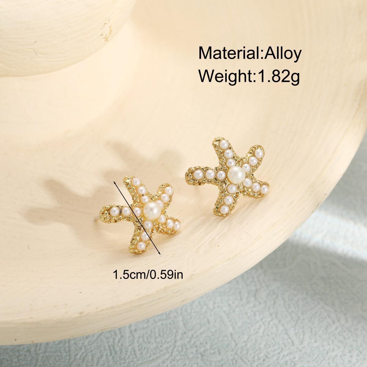 Popular cross-border fashionable, individual, small and elegant earrings from Europe and America, retro pearl inset, simple star and sea star stud earrings for women details Picture