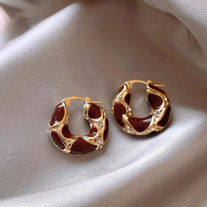 Retro Maillard tiger's eye earrings, Hong Kong style stud earrings, 2025 new bestseller earrings, with a unique design sense full figure