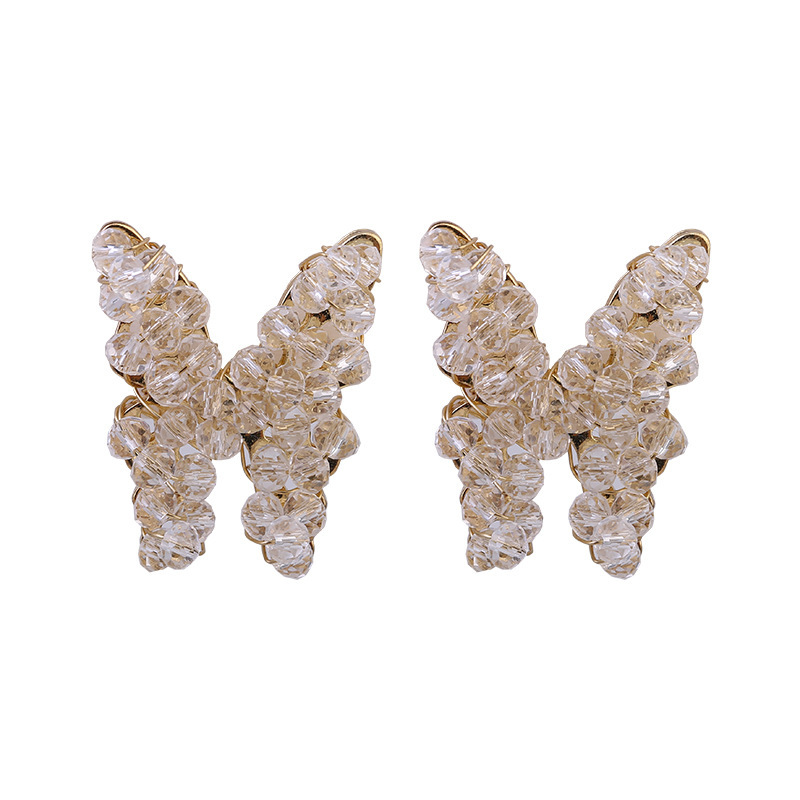 S925 Silver needle hand-woven sparkling pearl butterfly earrings, simple and elegant Korean stud earrings for women Item Picture