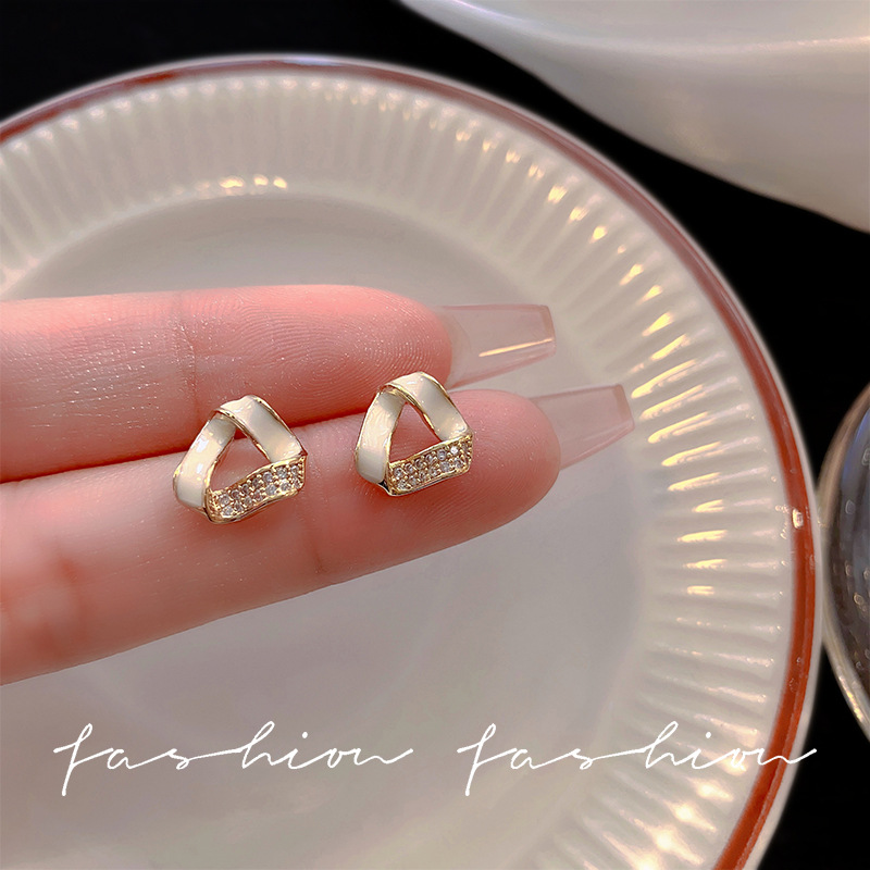 The light luxury triangular oil-dripping full-diamond stud earrings for women, S925, with silver needles, exude a sense of elegance and sophistication. They are exquisite and trendy details Picture