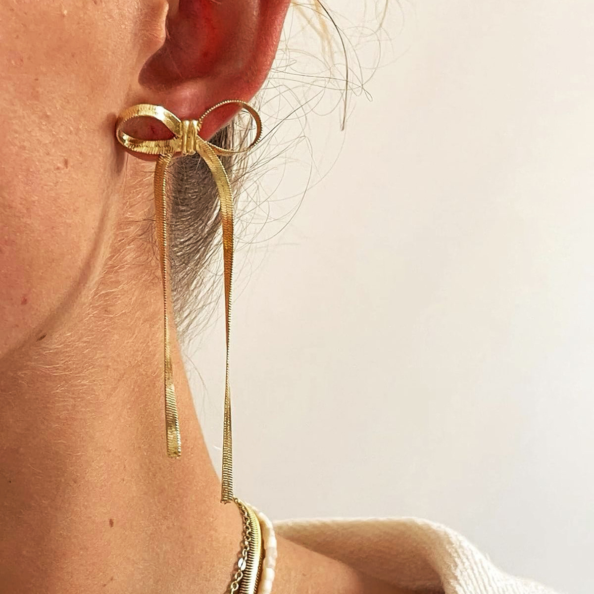 Cross-border new fashionable, simple and elegant long bow tassel earrings, niche, exaggerated and personalized earrings wholesale for women full figure