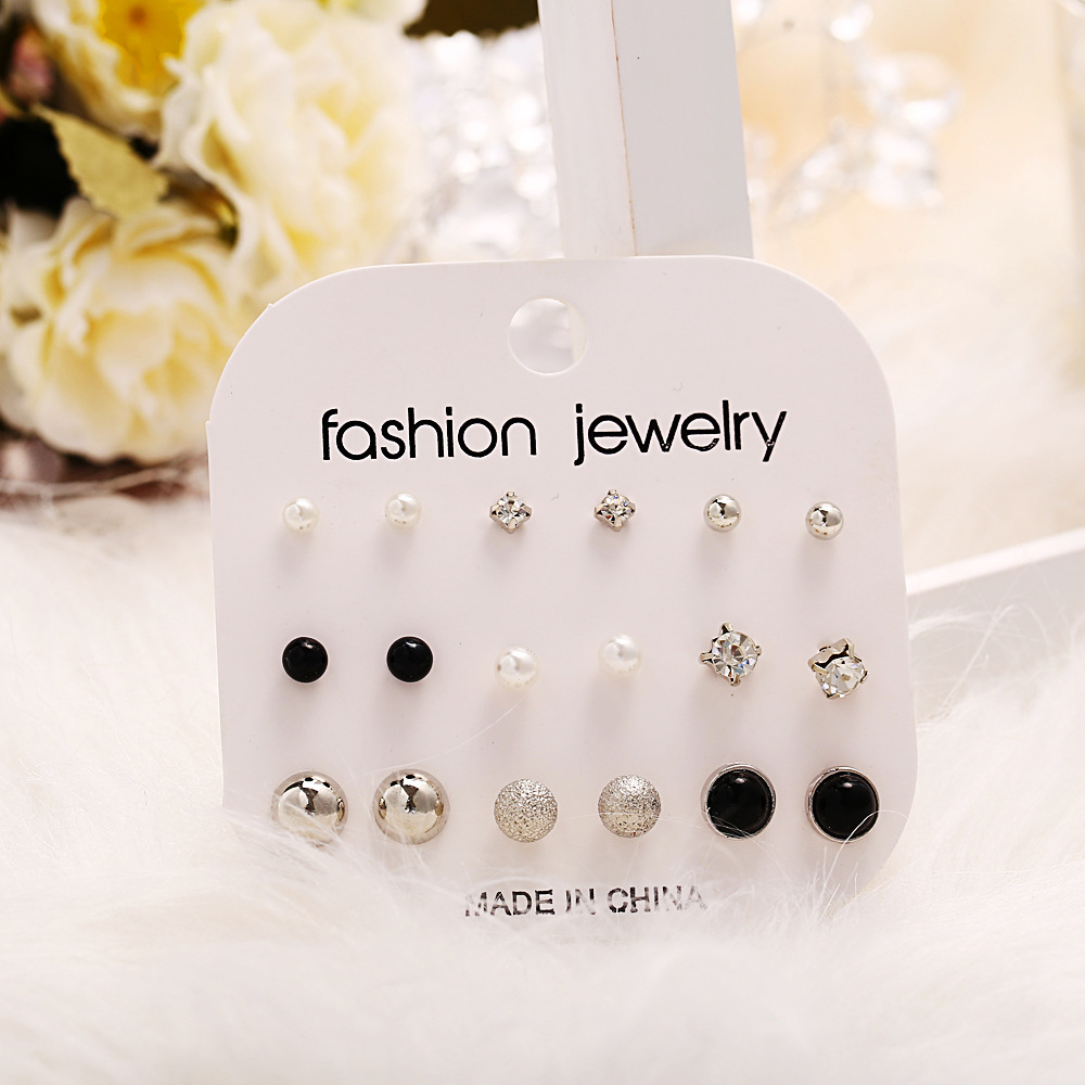 Wholesale of new cross-border ear stud sets of 9 pairs, creative, retro and simple artificial pearl black resin earrings from Europe and America Application Scenario