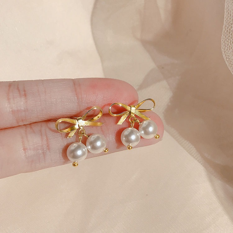 S925 Silver Needle Summer Fresh Mini Pearl Bow Stud Earrings, elegant Korean super fairy-like fashionable and personalized earrings Application Scenario