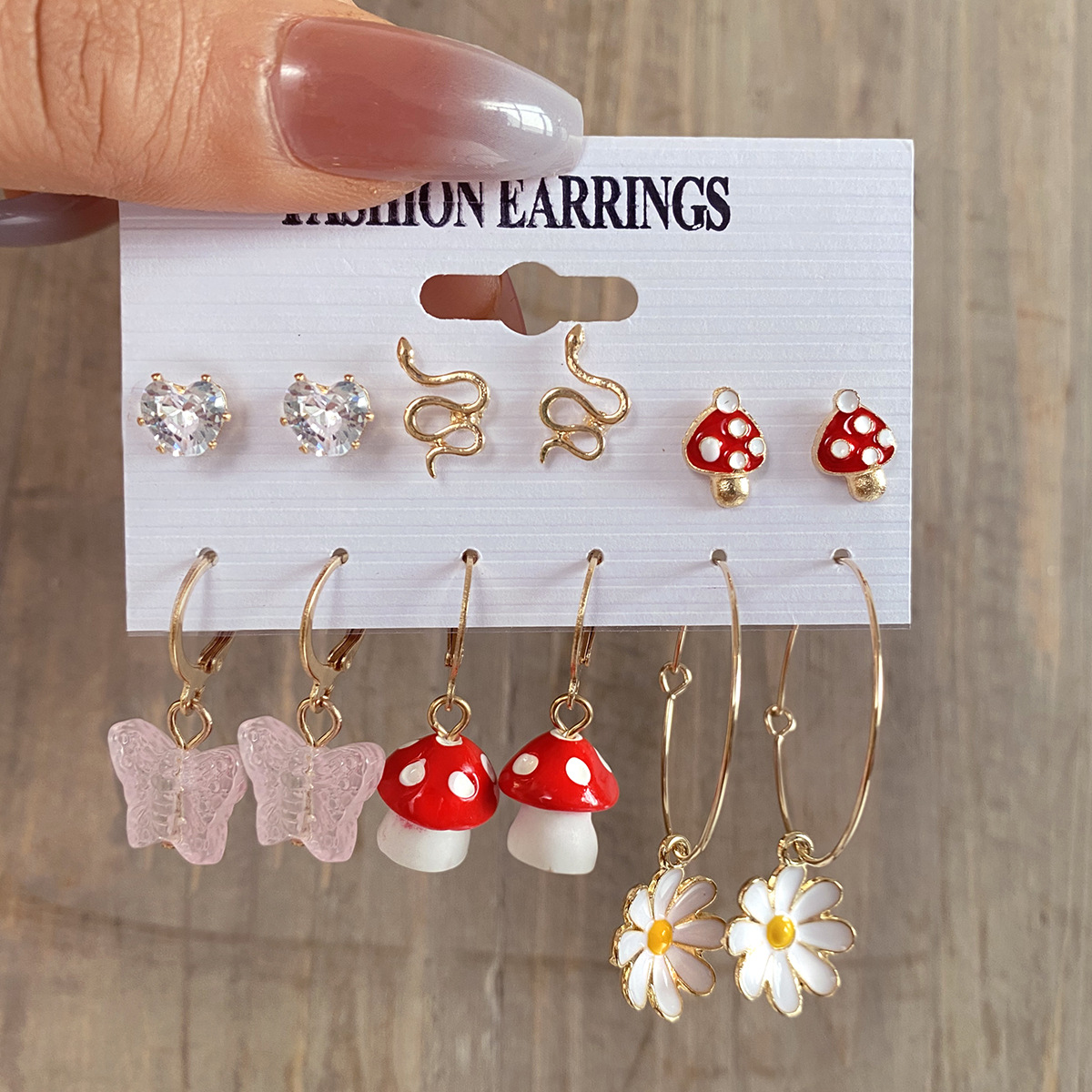 Wholesale of new mushroom earrings, creative flower earrings, mini snake-shaped stud earrings and flower earrings for foreign trade full figure