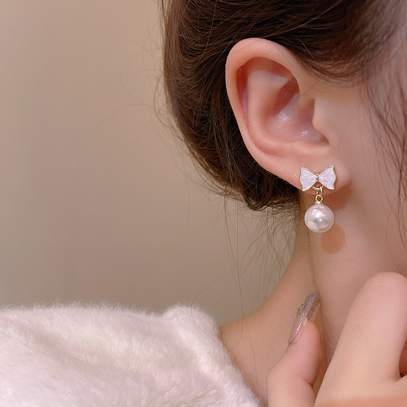 Sweet and elegant bow pearl stud earrings 925 silver needle, versatile and niche design, elegant and high-end earring accessories details Picture