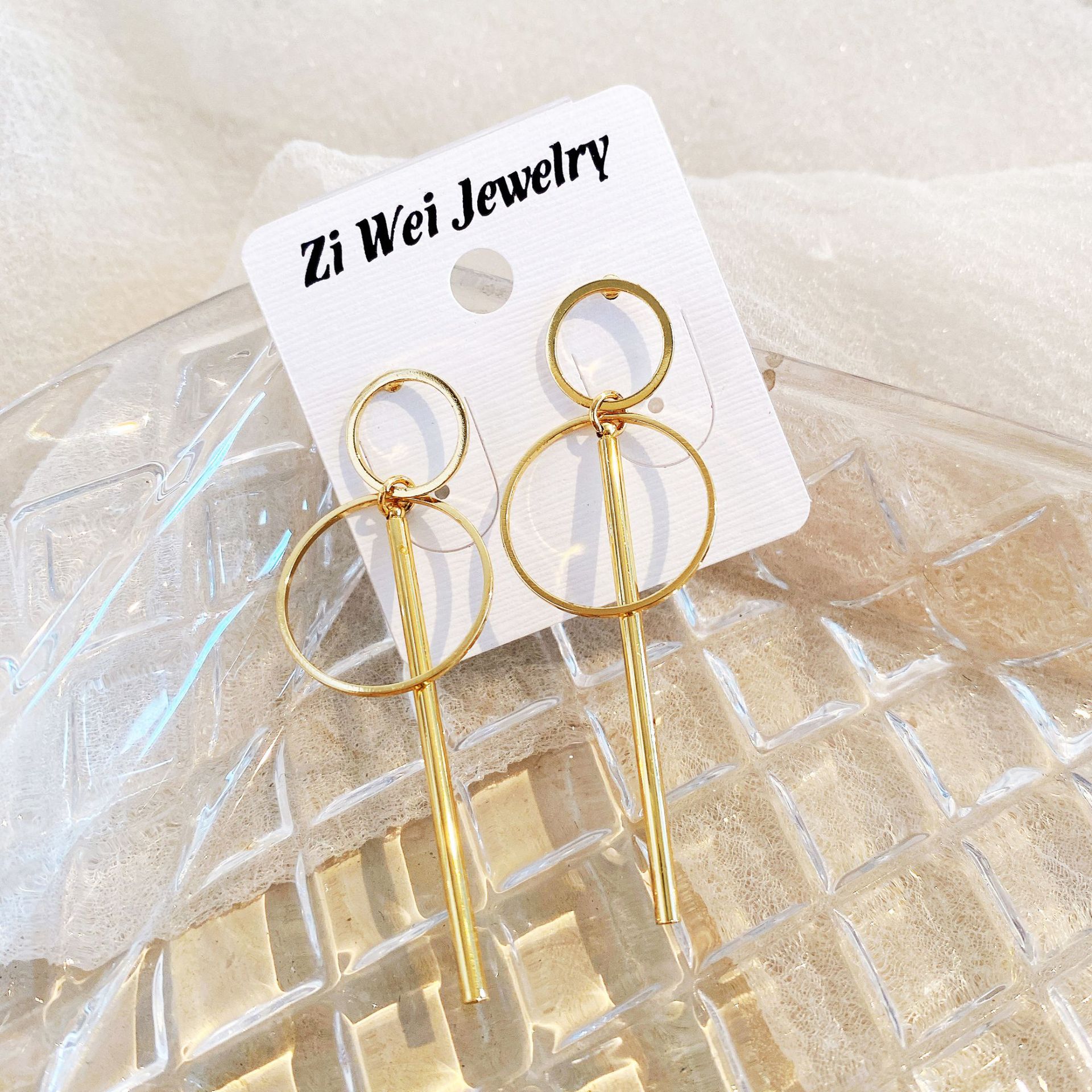 European and American best-selling simple geometric hollowed-out long alloy ear studs with large and small circles, creative golden long tassel ear studs Specification drawing
