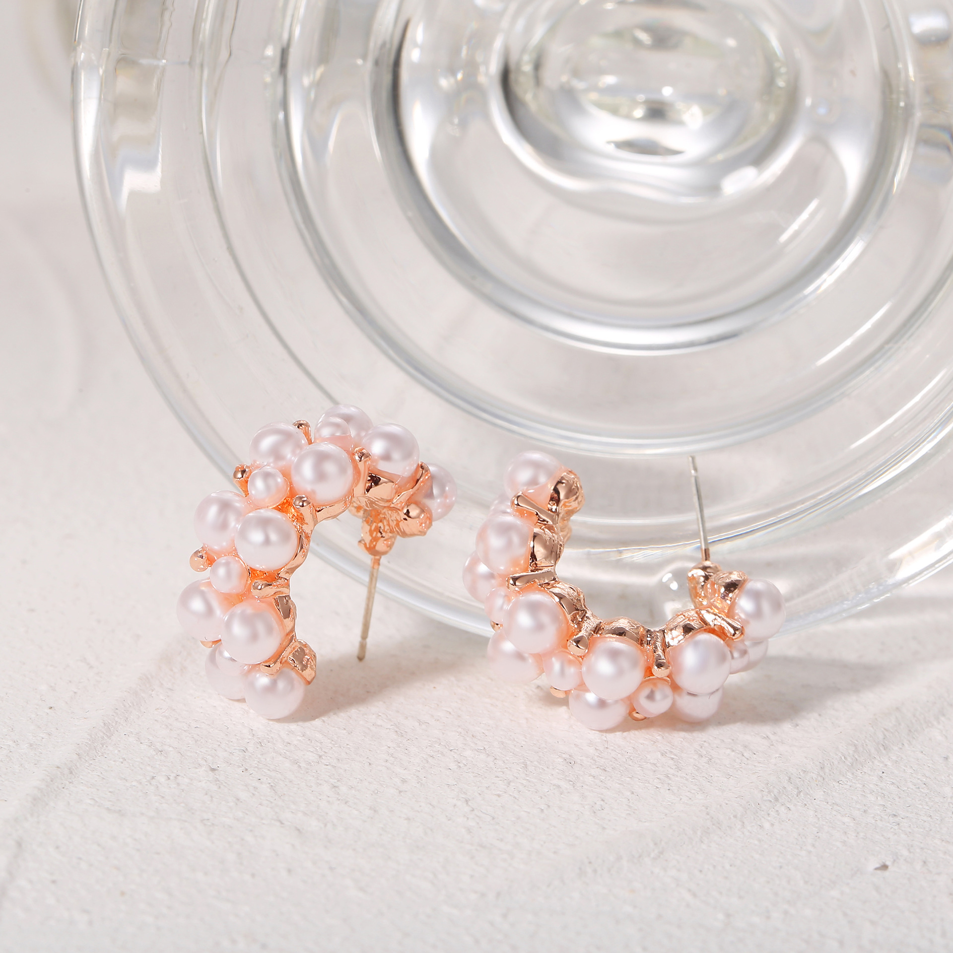 A set of 9-piece exquisite and high-end earrings in rose gold with a unique C-shaped style, exuding a sense of light luxury and sophistication Application Scenario