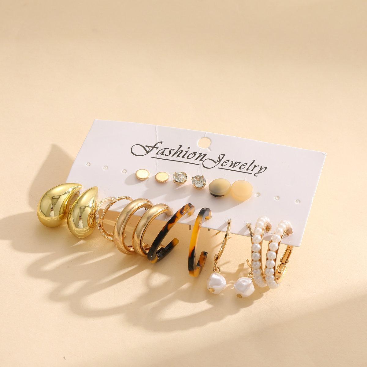 A 9-piece set of high-end retro pearl card earrings featuring cross-border alloy ear rings and square geometric shapes from Europe and America Application Scenario