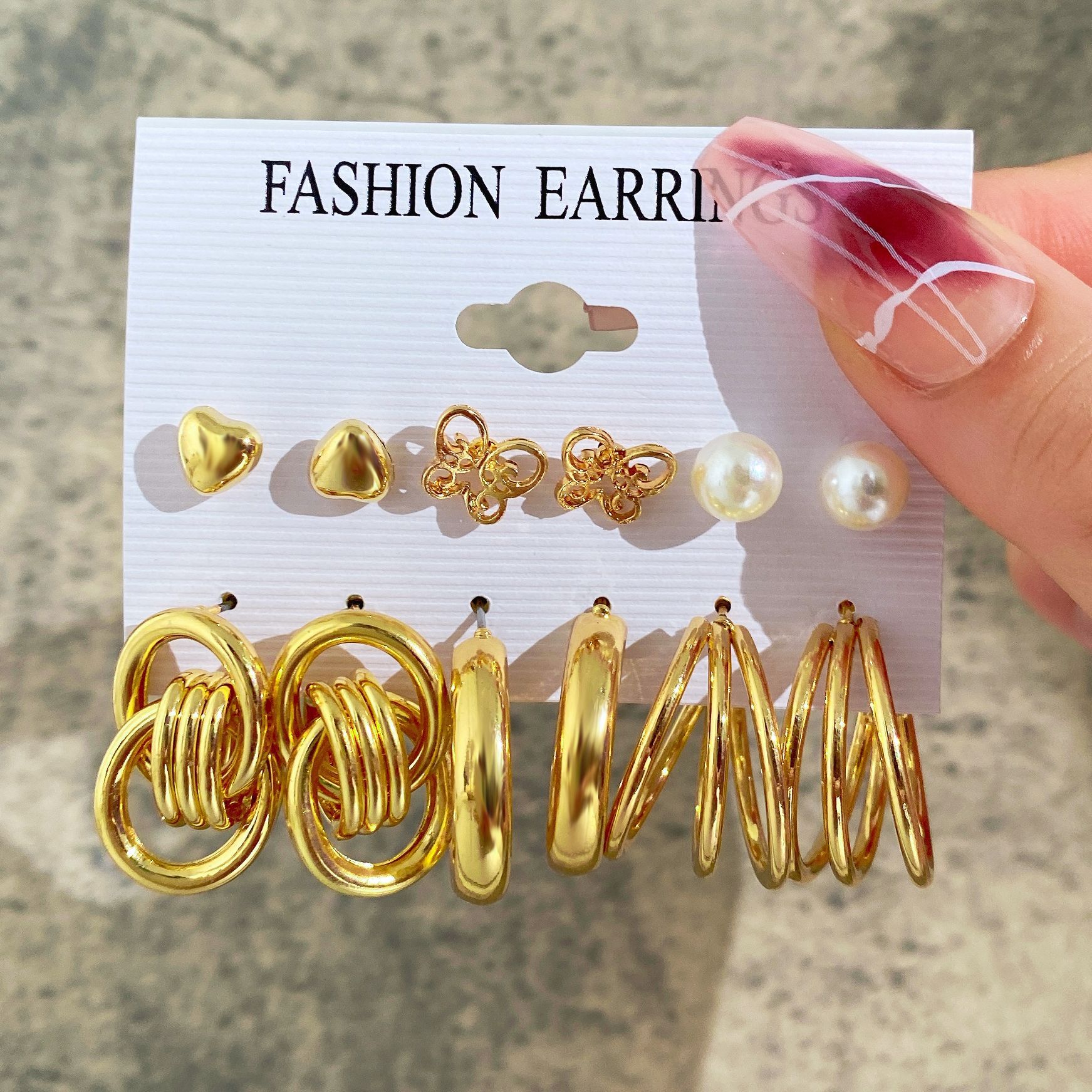 Wholesale of new cross-border personalized punk-style gold earrings, creative metal heart-shaped butterfly earrings set of 6 pieces full figure