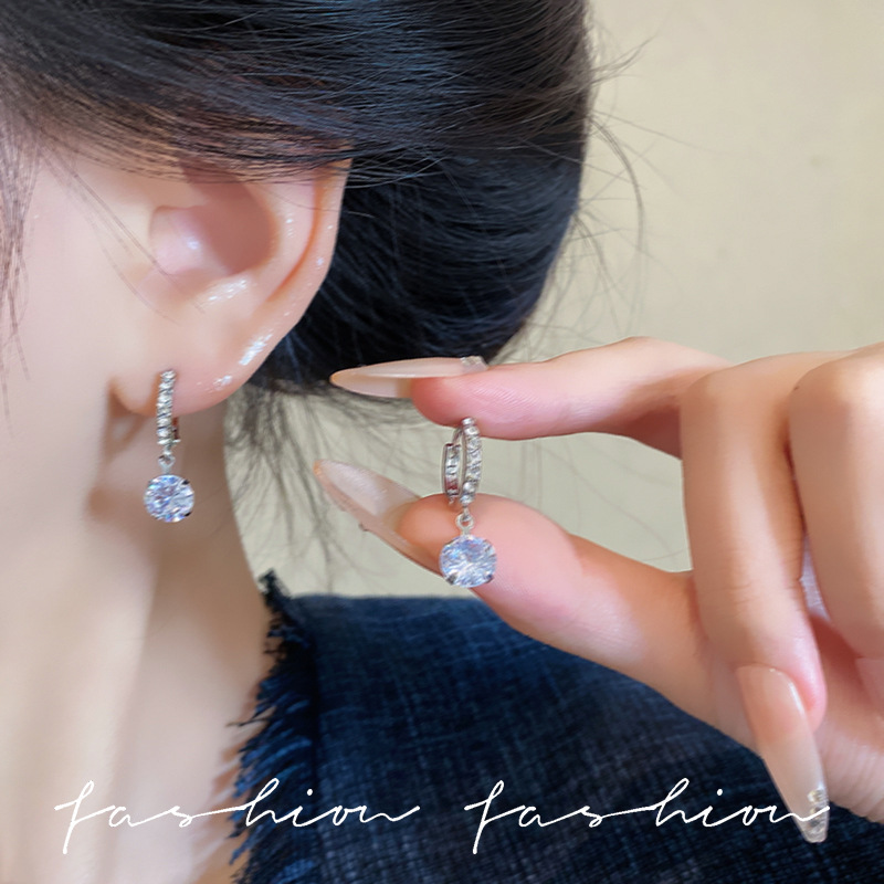 Korean version exquisite small diamond ear loops, silver needle small ball dynamic earrings, women's simple and elegant super shiny ear buckle earrings wholesale details Picture