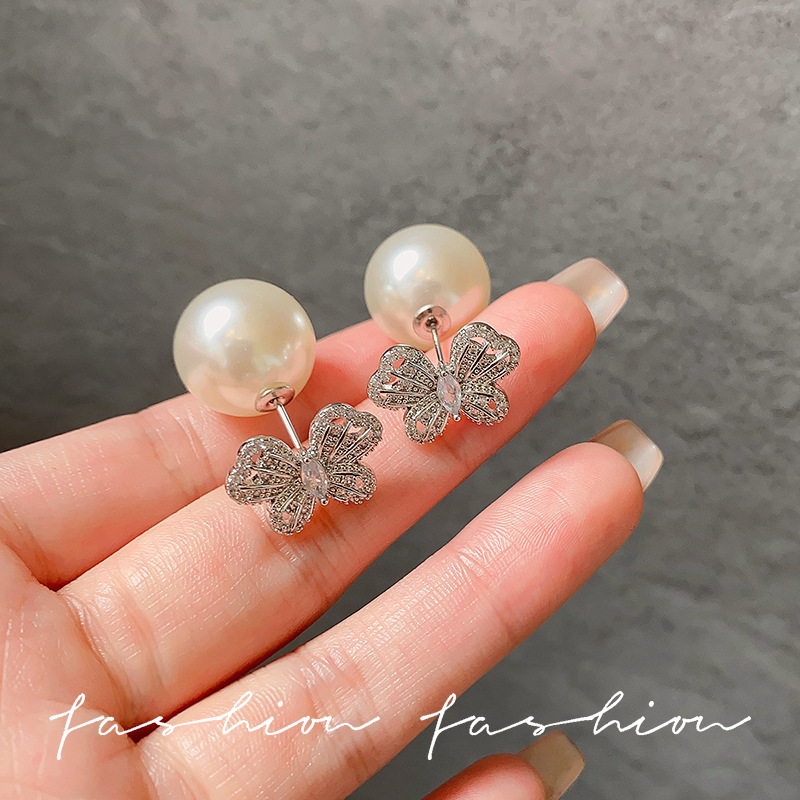The silver exquisite hollowed-out butterfly stud earrings exude a sense of light luxury and high-end elegance. The dual-wear earrings are unique and niche earrings Application Scenario