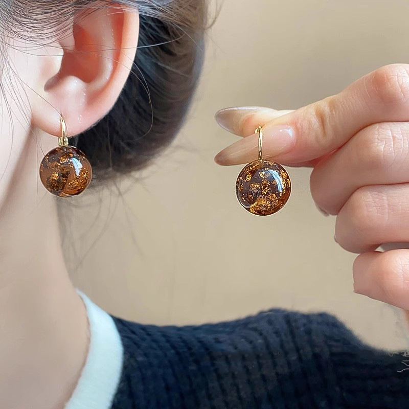 Hong Kong-style retro, clear and transparent round ball-tinted stud earrings, women's light luxury and high-end fashion earrings, unique and niche design earrings details Picture