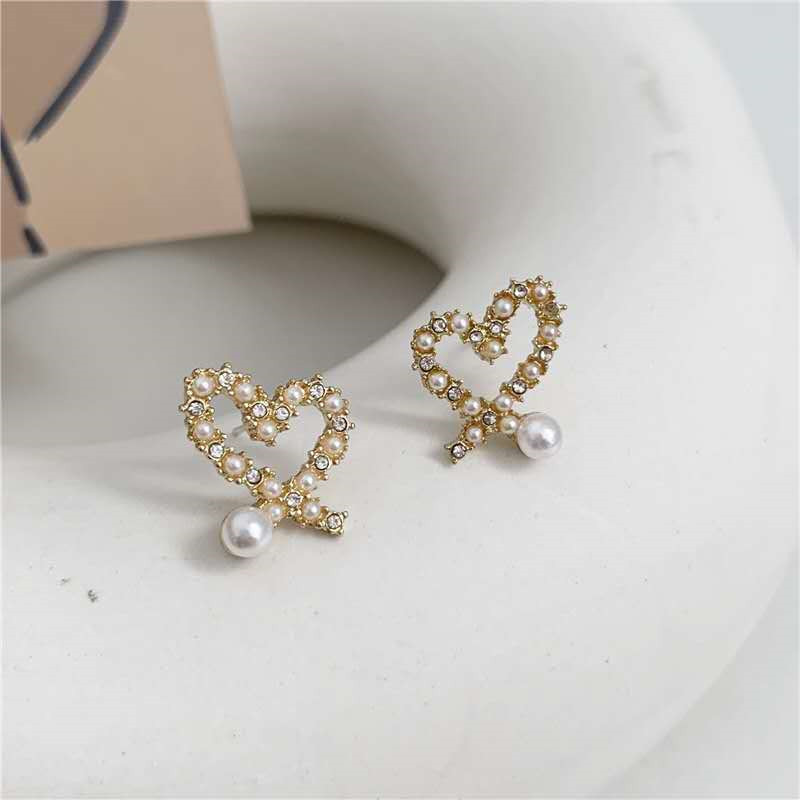 S925 Silver Needle Korean style, unique and irregular hollow heart-shaped pearl earrings, small and versatile, heart-shaped stud earrings for women Specification drawing