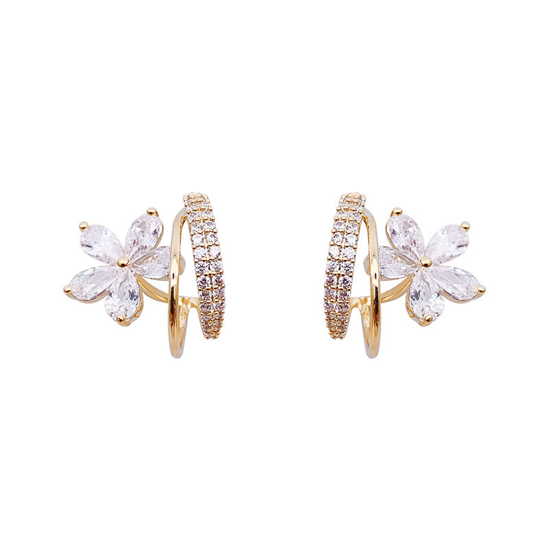 The super ethereal purple zircon flower earrings for women exude a light luxury, fashionable and sophisticated charm. The stud earrings are exquisite, simple and versatile Item Picture
