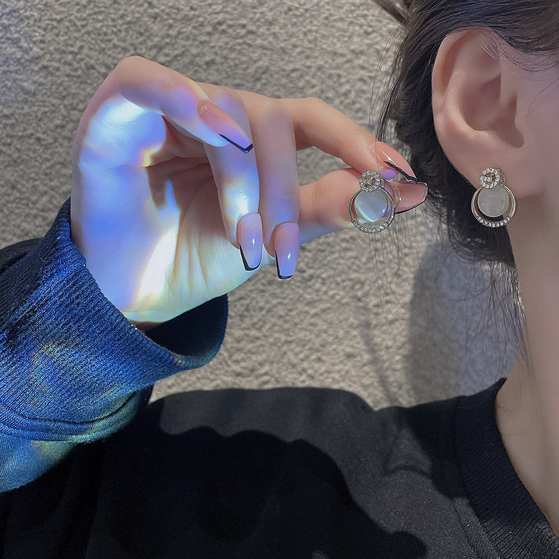 Light luxury and high-end, letter cat's eye stone ear studs, feminine charm, ins style earrings, 2023 new trendy earrings wholesale details Picture