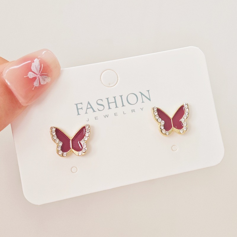 The new Korean sweet and cool black, red and white butterfly earrings feature a niche design and a touch of light luxury and sophistication details Picture