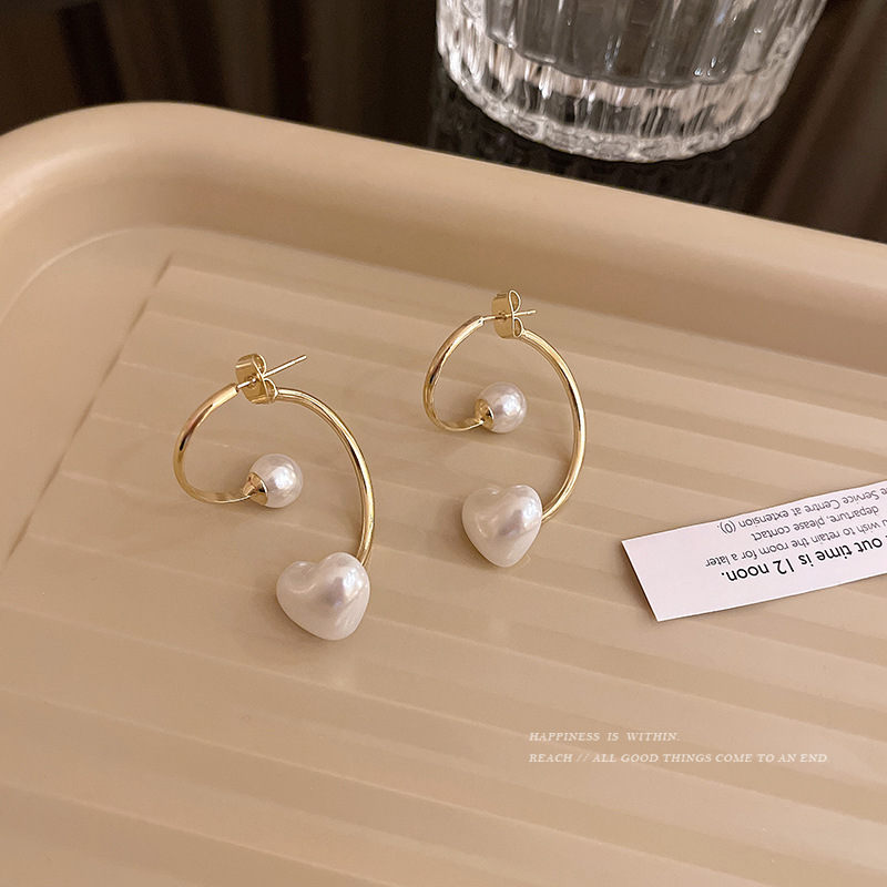 S925 silver needle niche geometric heart-shaped pearl earrings, women's Instagram simple and individual stud earrings, new fashionable earrings trend Specification drawing