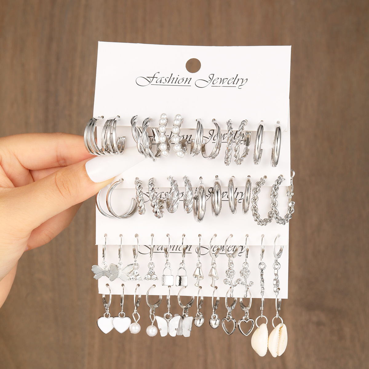 European and American new cross-border simple ins three-tube butterfly rose mushroom shell earrings 24-piece set earrings full figure