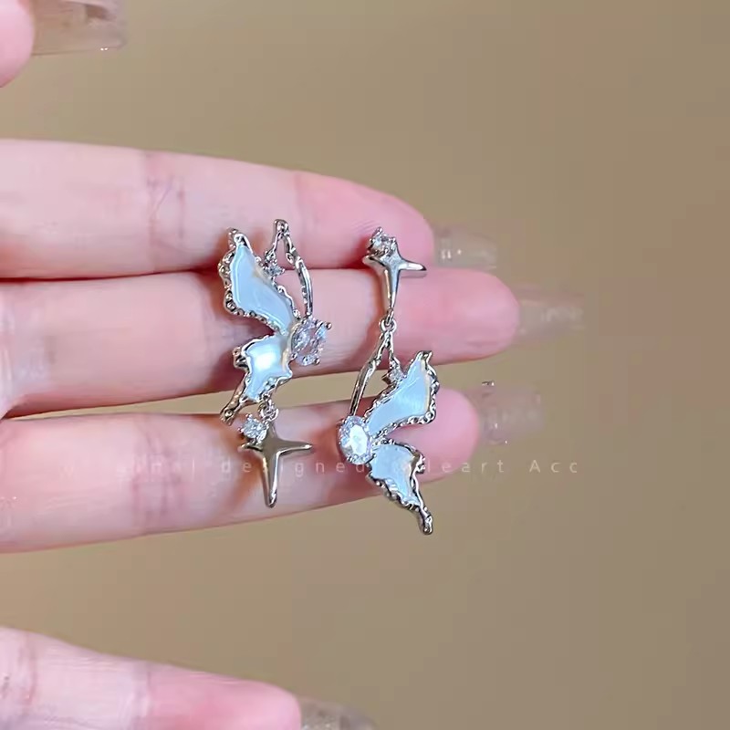 Silver asymmetrical butterfly earrings for women, with a unique and exquisite design, are delicate stud earrings that accentuate the face, exuding a fairy-like and light luxury charm details Picture