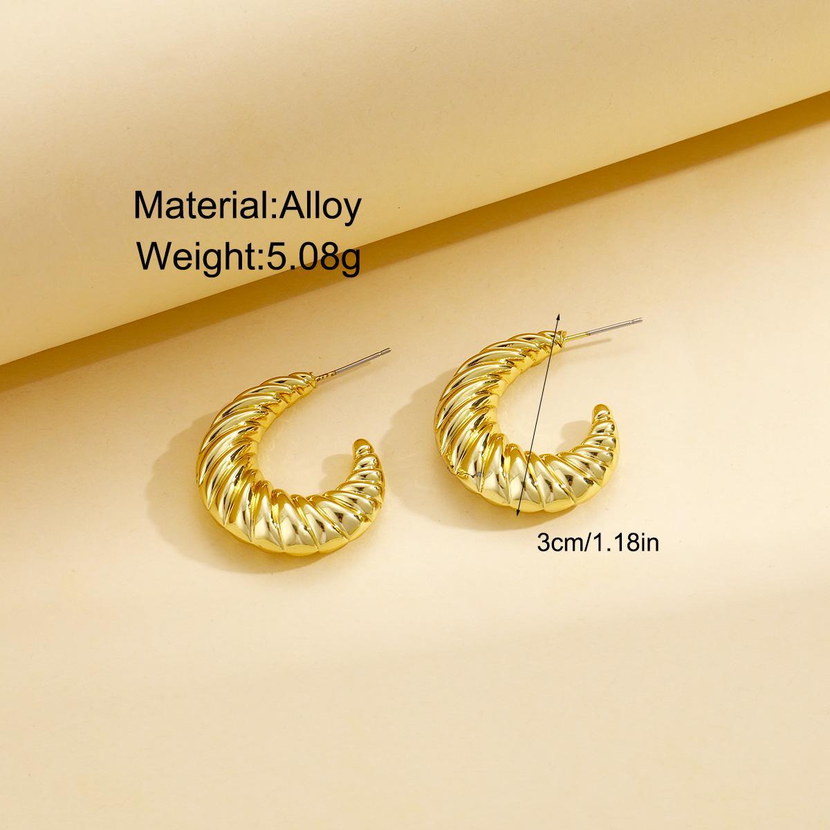 Cross-border European and American new personalized twist fashion earring, women's creative, simple and irregular moon retro exaggerated earrings details Picture